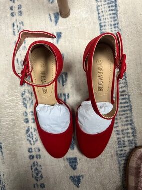 Red high heeled dress shoes